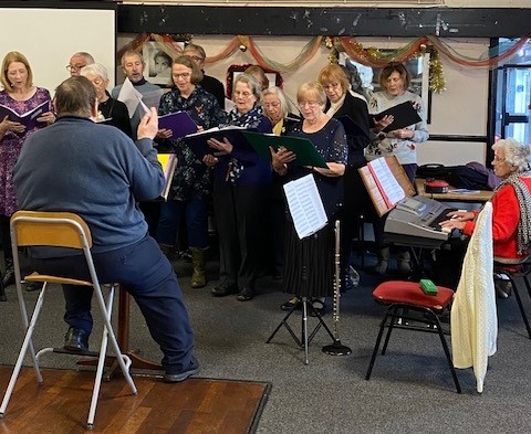 Group singing at Christmas Gathering